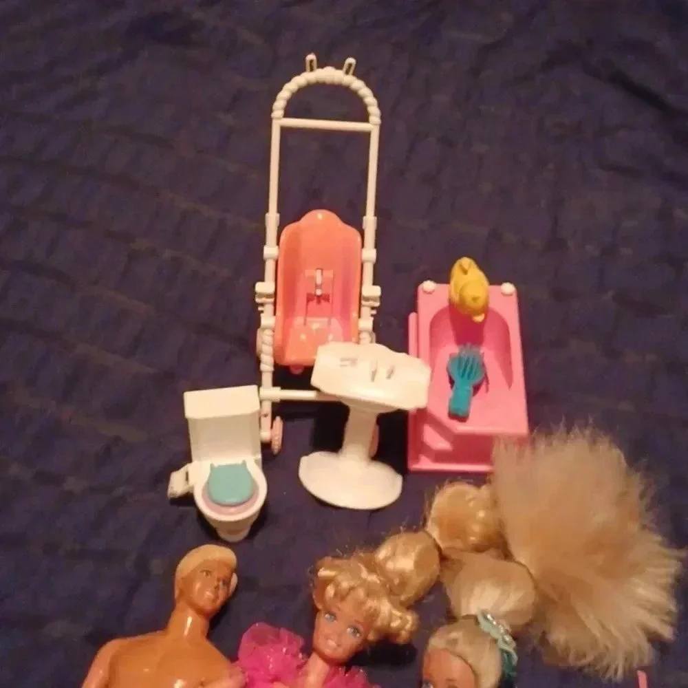 2 vintage Mattel Barbie dolls , one  Ken and one mini with extras